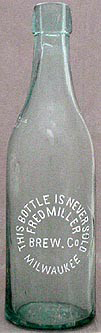 FRED MILLER BREWING COMPANY EMBOSSED BEER BOTTLE