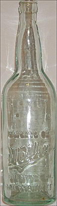 MILLER BREWING COMPANY EMBOSSED BEER BOTTLE