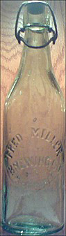 FRED MILLER BREWING COMPANY EMBOSSED BEER BOTTLE