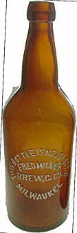 FRED MILLER BREWING COMPANY EMBOSSED BEER BOTTLE