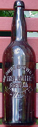 FRED MILLER BREWING COMPANY EMBOSSED BEER BOTTLE