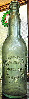 FRED MILLER BREWING COMPANY EMBOSSED BEER BOTTLE