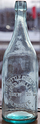 FRED MILLER BREWING COMPANY EMBOSSED BEER BOTTLE