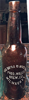 FRED MILLER BREWING COMPANY EMBOSSED BEER BOTTLE