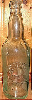 FRED MILLER BREWING COMPANY EMBOSSED BEER BOTTLE