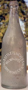 MILWAUKEE BREWING COMPANY EMBOSSED BEER BOTTLE