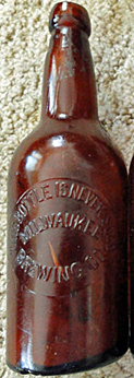 MILWAUKEE BREWING COMPANY EMBOSSED BEER BOTTLE