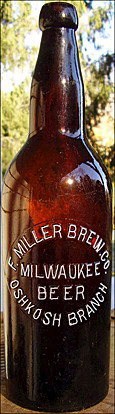 FRED MILLER BREWING COMPANY EMBOSSED BEER BOTTLE