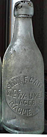 SIMON F. GATES MILWAUKEE LAGER EMBOSSED BEER BOTTLE