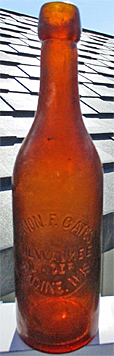 SIMON F. GATES MILWAUKEE LAGER EMBOSSED BEER BOTTLE