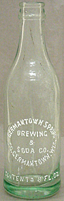 GERMANTOWN SPRING BREWING & SODA COMPANY EMBOSSED BEER BOTTLE