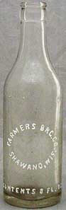 FARMERS BREWING COMPANY EMBOSSED BEER BOTTLE