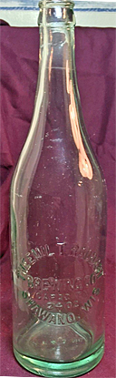 THE EMIL T. RADDANT BREWING COMPANY EMBOSSED BEER BOTTLE