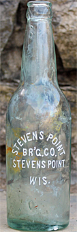 STEVENS POINT BREWING COMPANY EMBOSSED BEER BOTTLE