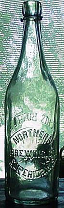 NORTHERN BREWING COMPANY EMBOSSED BEER BOTTLE