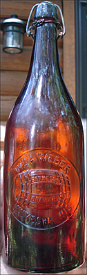 WILLIAM A. WEBER LAND BETHESDA BREWERY EMBOSSED BEER BOTTLE