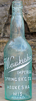 WAUKESHA IMPERIAL SPRING BREWING COMPANY EMBOSSED BEER BOTTLE