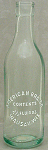 AMERICAN BREWING COMPANY EMBOSSED BEER BOTTLE