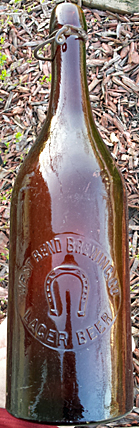 WEST BEND BREWING COMPANY LAGER BEER EMBOSSED BEER BOTTLE