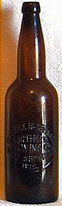 NORTHERN BREWING COMPANY EMBOSSED BEER BOTTLE