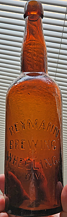 REYMANN BREWING COMPANY EMBOSSED BEER BOTTLE