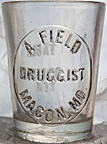 A. FIELD DRUGGIST MEASURING DOSE GLASS