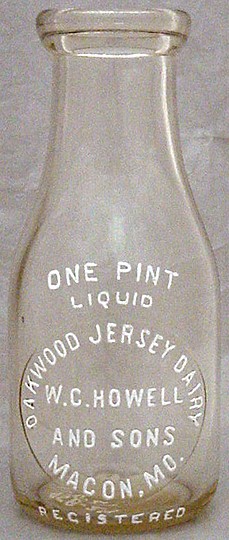 OAKWOOD JERSEY DAIRY W. C. HOWELL & SONS MACON, MISSOURI MILK BOTTLE